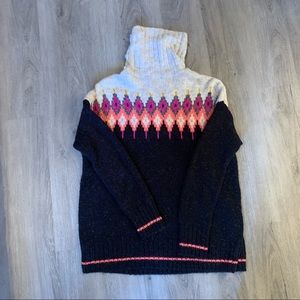 Women’s turtle neck sweater.